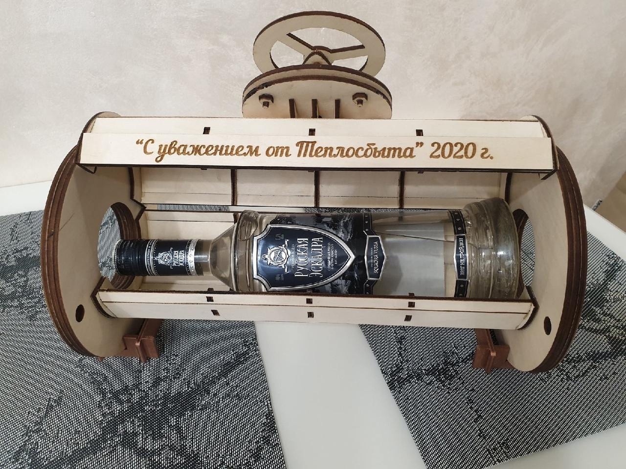 Descarga porta botella tipo valvula