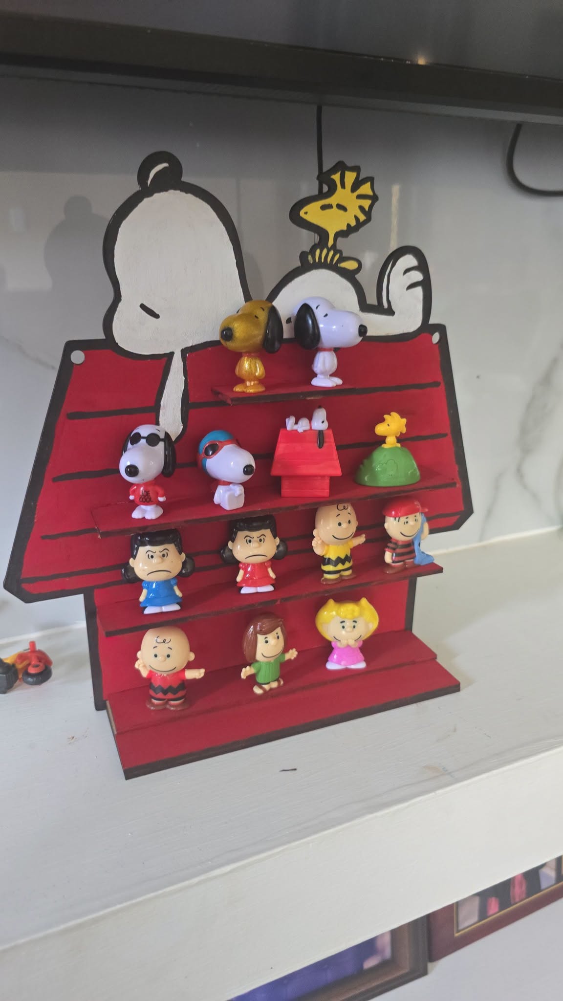 Exhibidor Snoopy